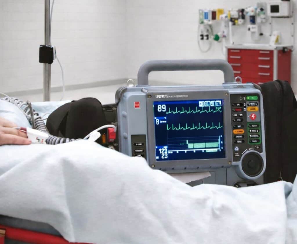 Patient in hospital with cardiovascular machines