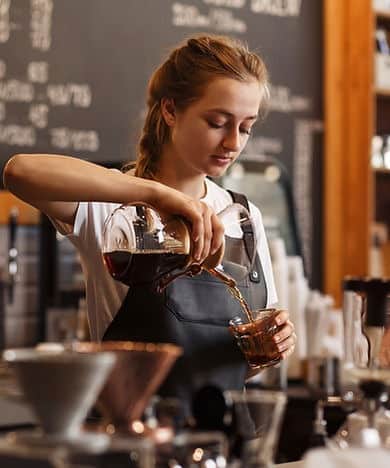 Barista making a cup of coffee