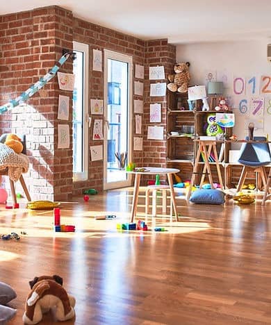 Daycare classroom with toys and learning materials.